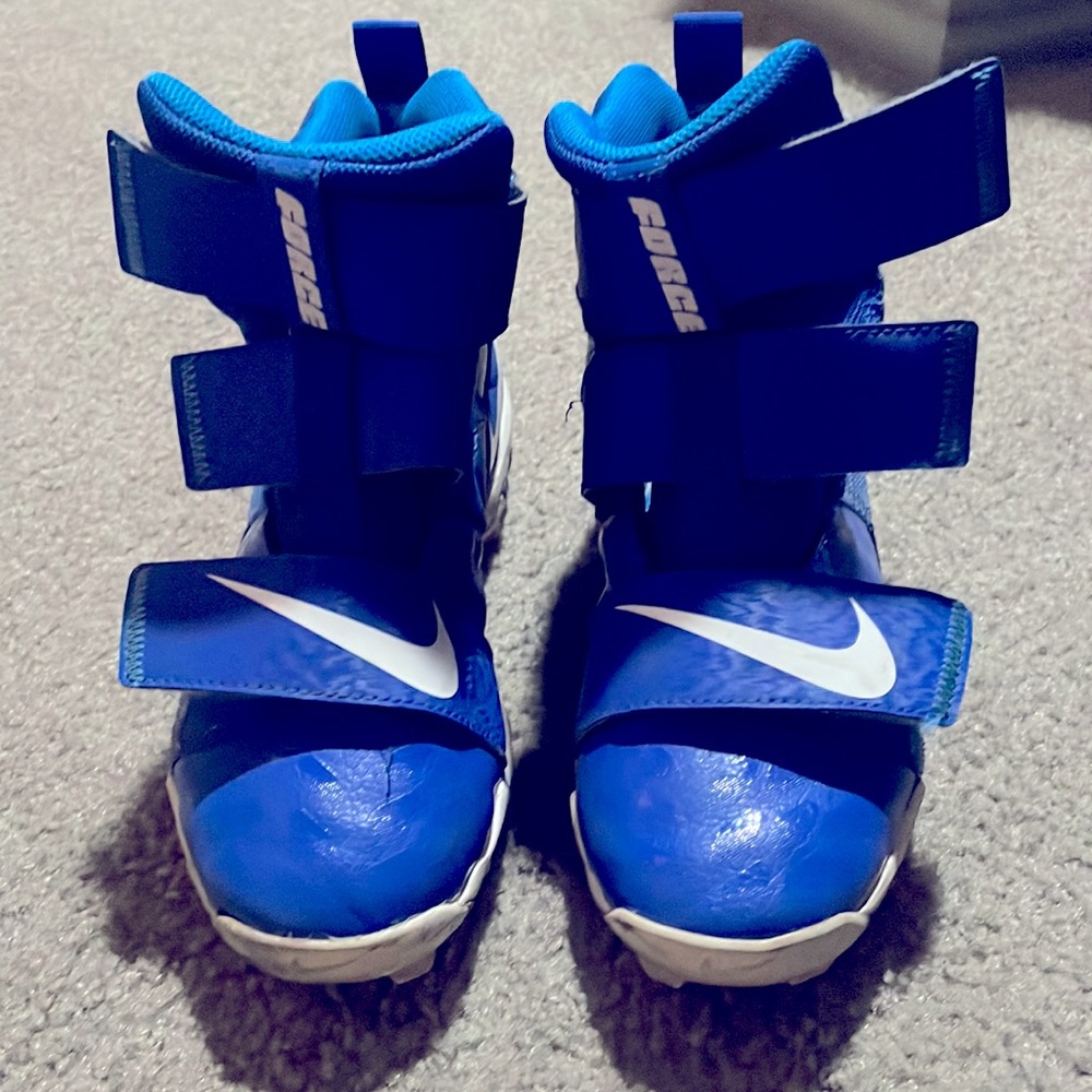 Nike youth football high top cleats. Velcro no lacing